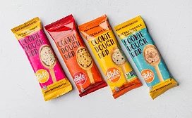 Four bars of Dible Dough edible cookie dough