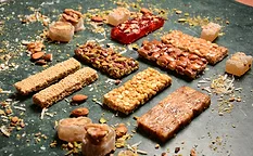 Assortment of different snack bars on table